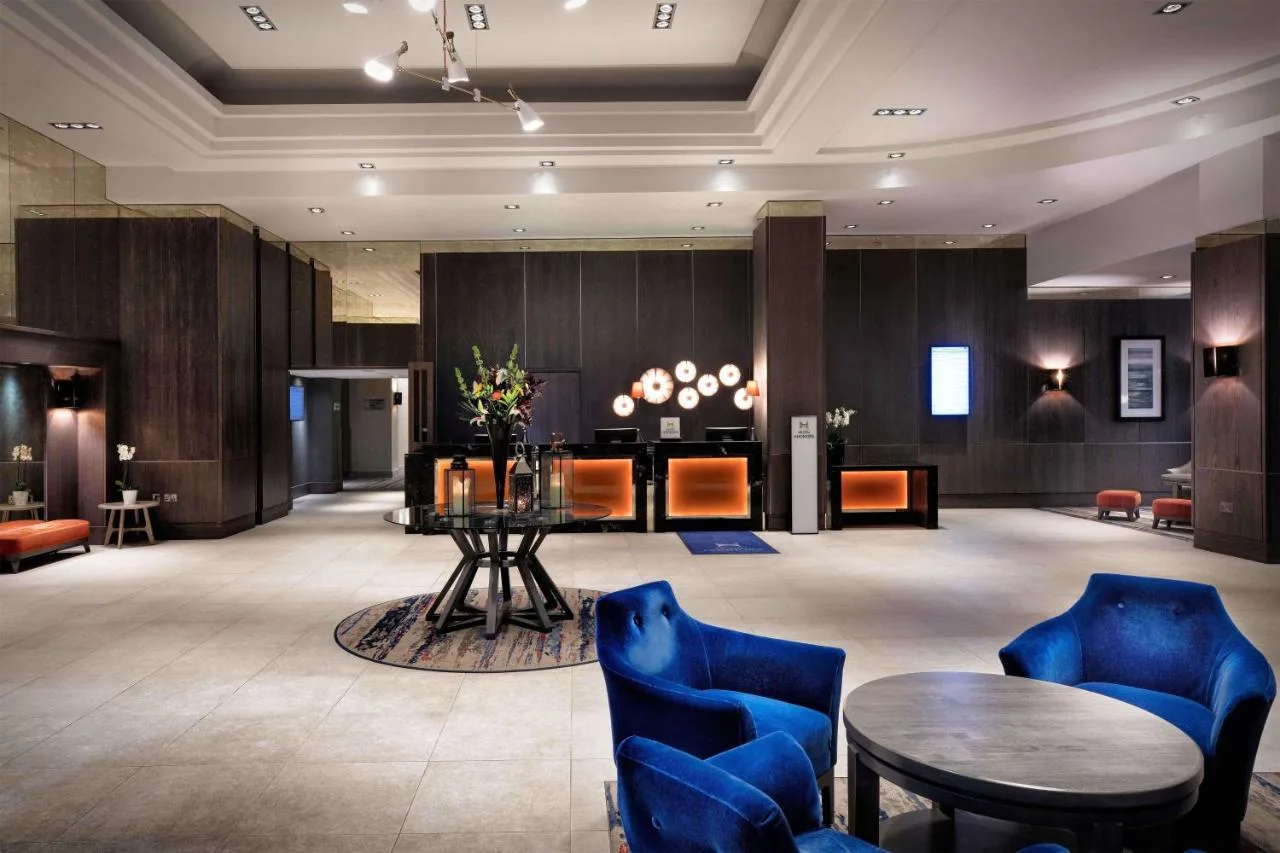 Hotel lobby with blue chairs at DoubleTree by Hilton Glasgow Central