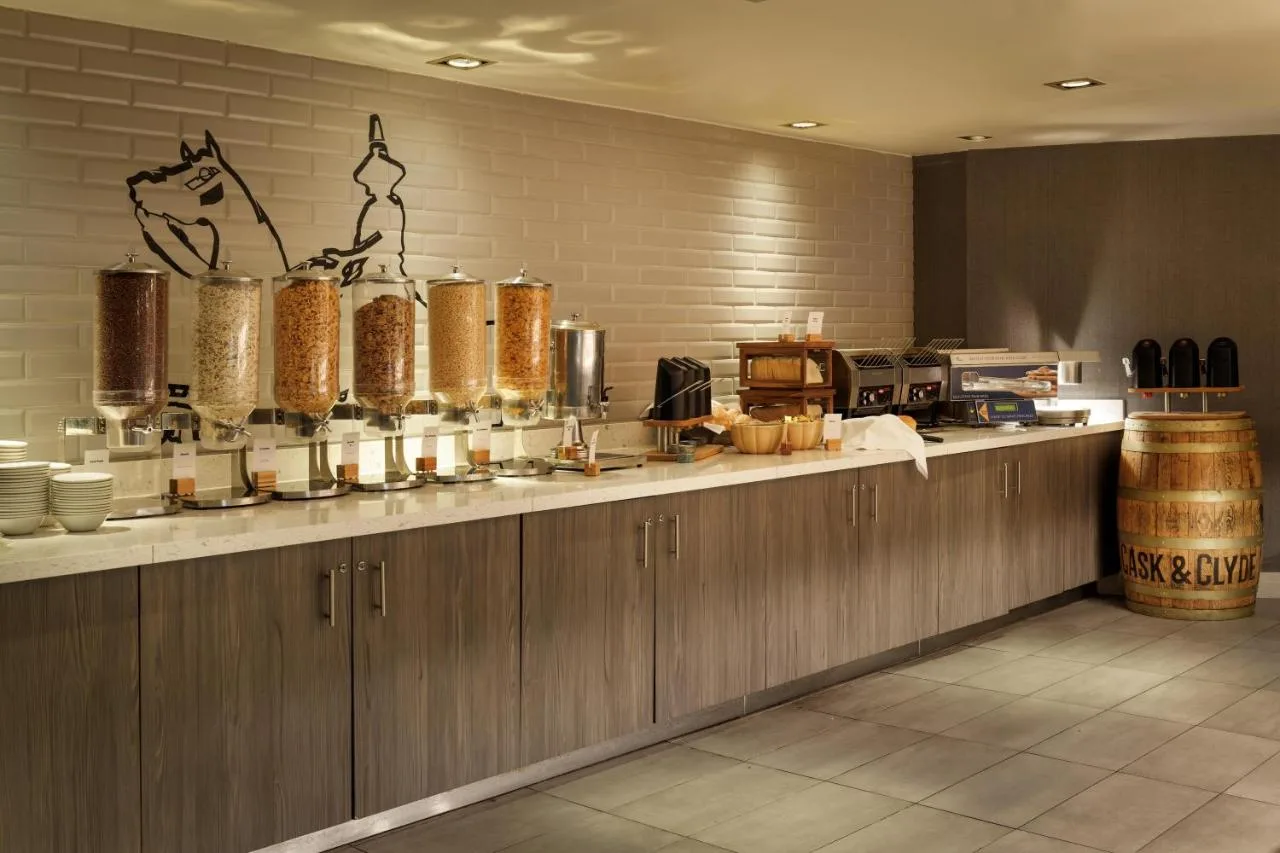 Kitchen counter laid out with breakfast food at the Glasgow hotel