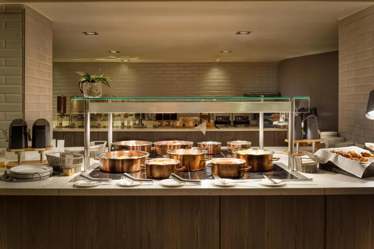 Hotel kitchen with pots and pans preparing meals